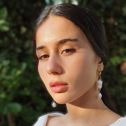 עגילי פנינים טבעיות בעיצוב אלגנטי