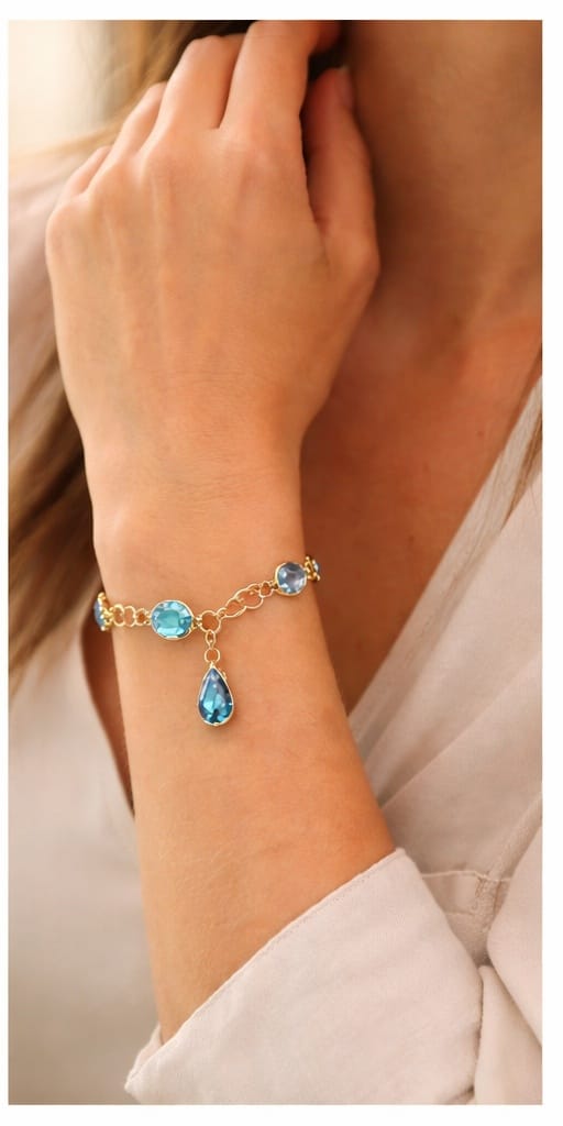 צמיד כסף בציפוי זהב עם אבני קריסטל בגווני כחול וטורקיז