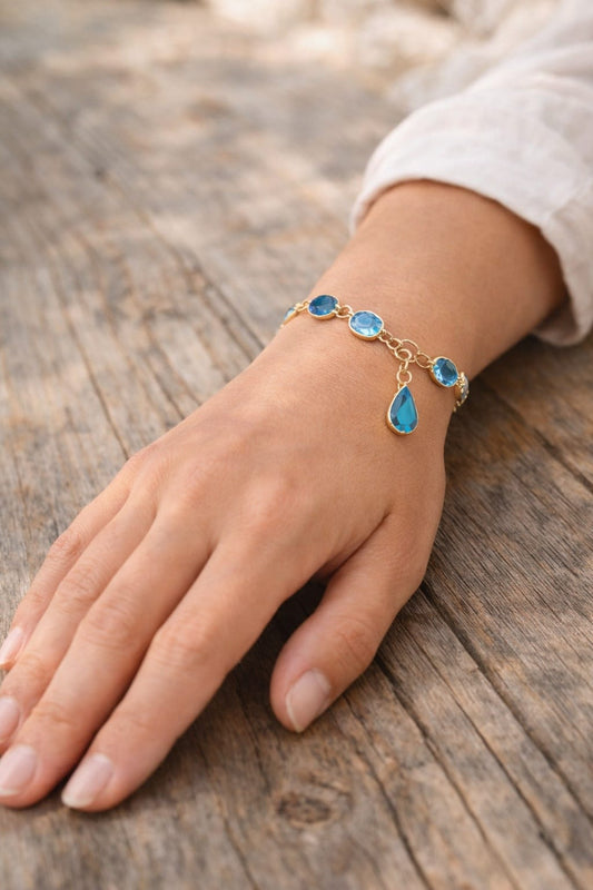 צמיד כסף בציפוי זהב עם אבני קריסטל בגווני כחול וטורקיז