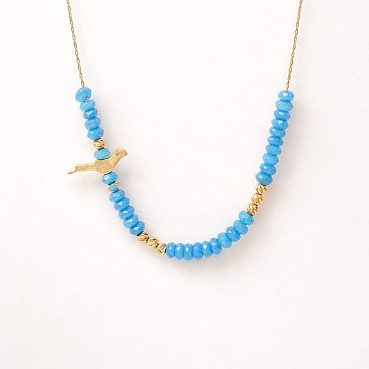 שרשרת לילדות עם אבני קריסטל כחולות וציפור גולדפילד