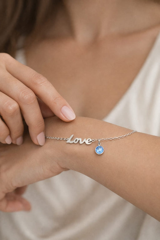 צמיד אהבה מכסף סטרלינג עם אבן קריסטל כחולה