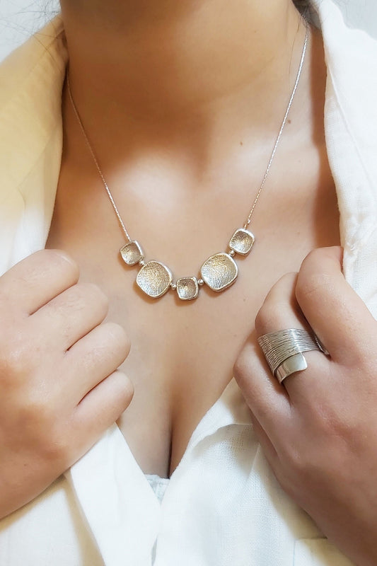 Geometric Silver Necklace with Engraved Texture